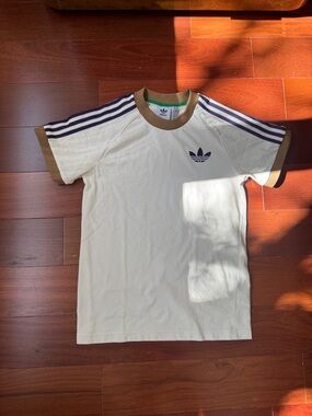 adidas Cream Short Sleeve Tee with Purple Stripes and Brown Trim